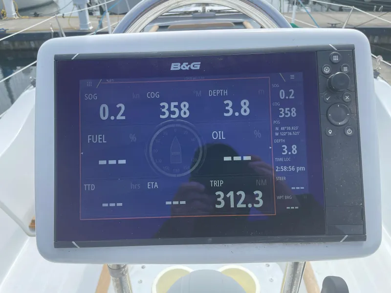 Slide: The Image of B&G navigation display on 2000 Beneteau Oceanis 321 sailboat, showing speed, course, and depth. - 30