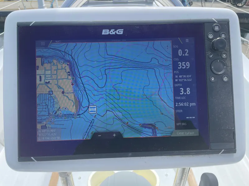 Slide: The Image of B&G navigation display on 2000 Beneteau Oceanis 321 sailboat, showing nautical chart and data. - 32