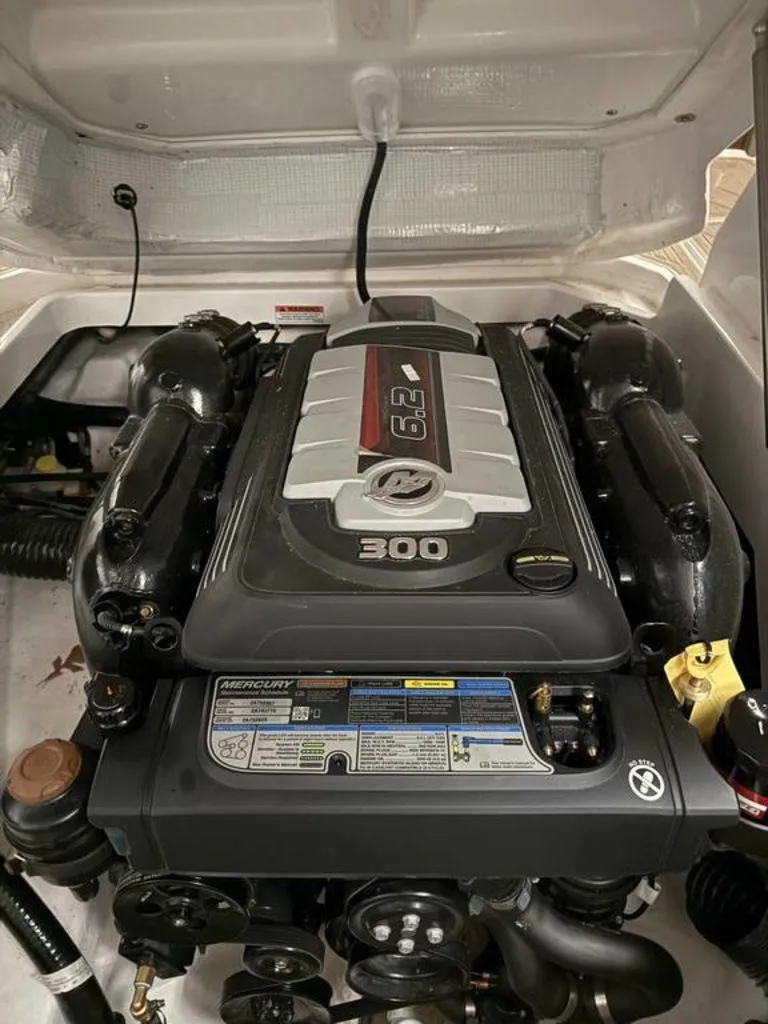 Slide: The Image of 2023 Monterey 258SS boat engine, featuring a powerful Mercury 6.2L 300 horsepower motor. - 2