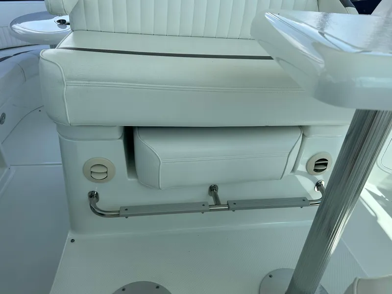 Slide: The Image of 2009 Cruisers Yachts 390 Sports Coupe interior seating with white upholstery and sleek design. - 30
