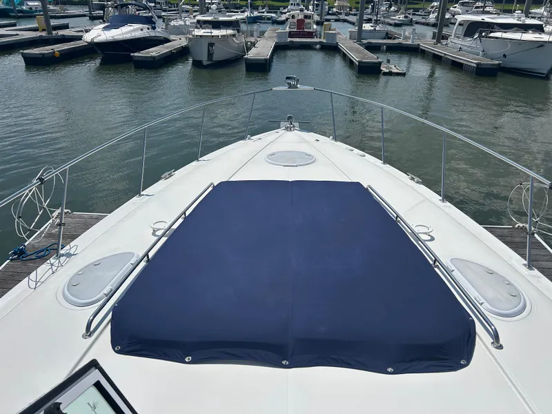 Slide: The Image of 2009 Cruisers Yachts 390 Sports Coupe docked at marina, view from bow. - 36