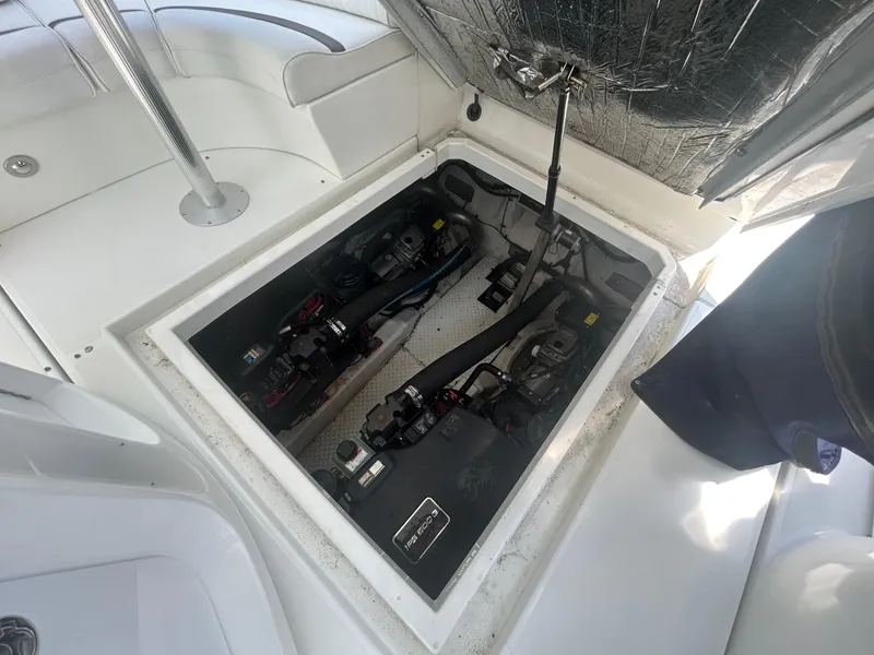 Slide: The Image of Engine compartment of 2009 Cruisers Yachts 390 Sports Coupe, showcasing mechanical components. - 41