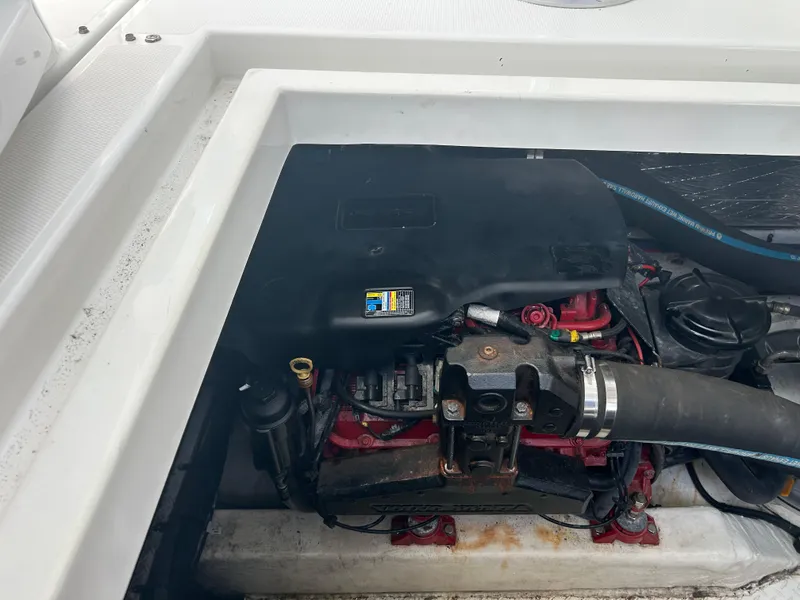 Slide: The Image of Engine compartment of 2009 Cruisers Yachts 390 Sports Coupe, showcasing mechanical components. - 44