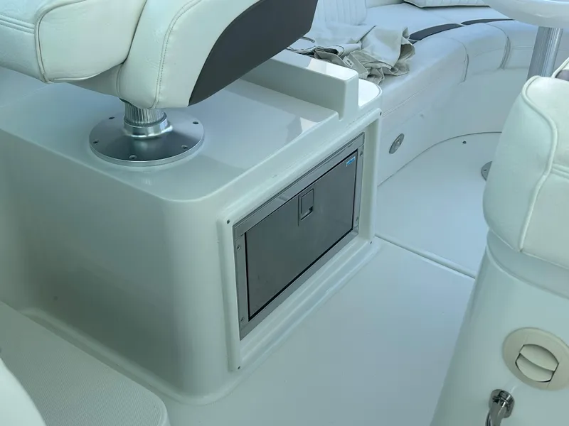 Slide: The Image of 2009 Cruisers Yachts 390 Sports Coupe interior seating and storage compartment. - 28