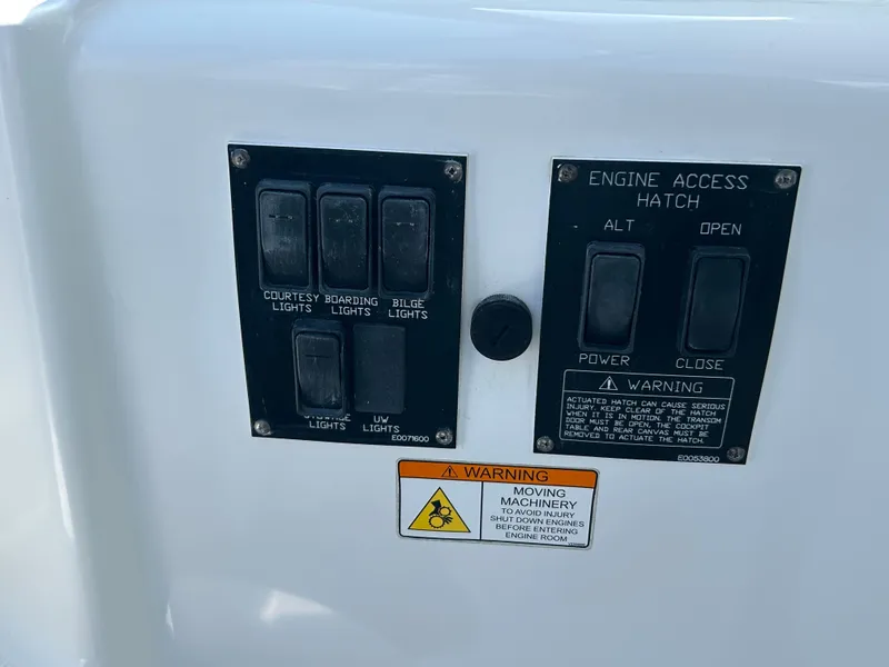 Slide: The Image of Control panel on a 2009 Cruisers Yachts 390 Sports Coupe with warning labels. - 42