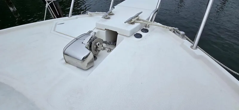 Slide: The Image of 2013 Cutwater C-28 boat deck with anchor winch and railing. - 10