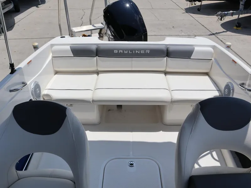 Slide: The Image of 2022 Bayliner 170 BR boat interior with white seating and modern design. - 20