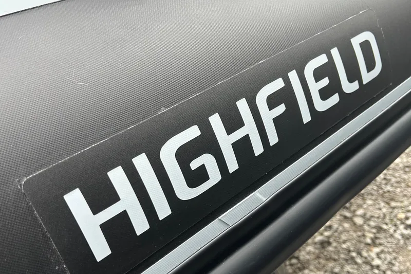 Slide: The Image of 2024 Highfield Classic 340 FCT boat logo on a textured surface. - 14