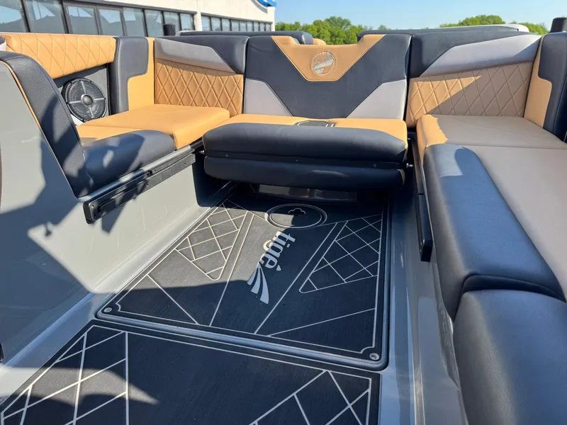 Slide: The Image of 2022 Tigé Z3 boat interior with stylish seating and custom flooring design. - 14