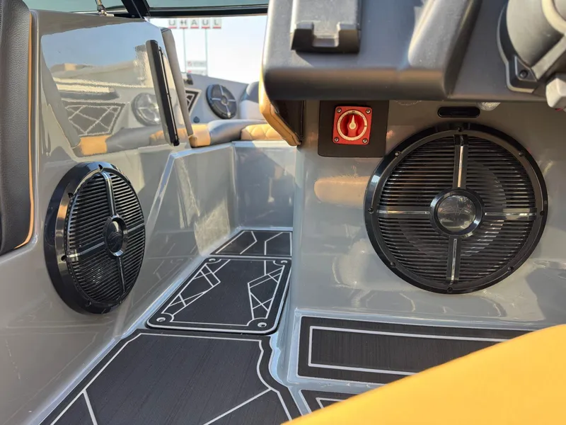 Slide: The Image of 2022 Tigé Z3 boat interior with speakers and modern design elements. - 22