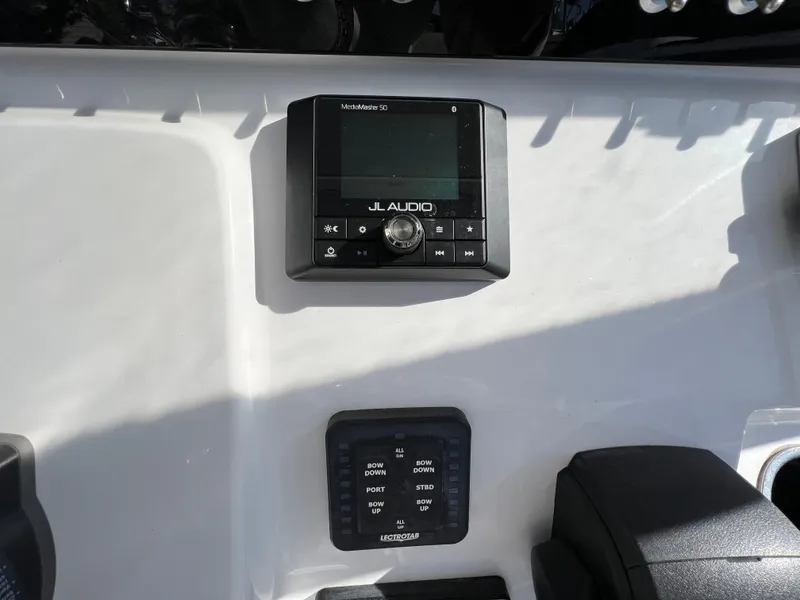 Slide: The Image of 2021 Sportsman Heritage 231 Center Console dashboard with JL Audio system. - 37