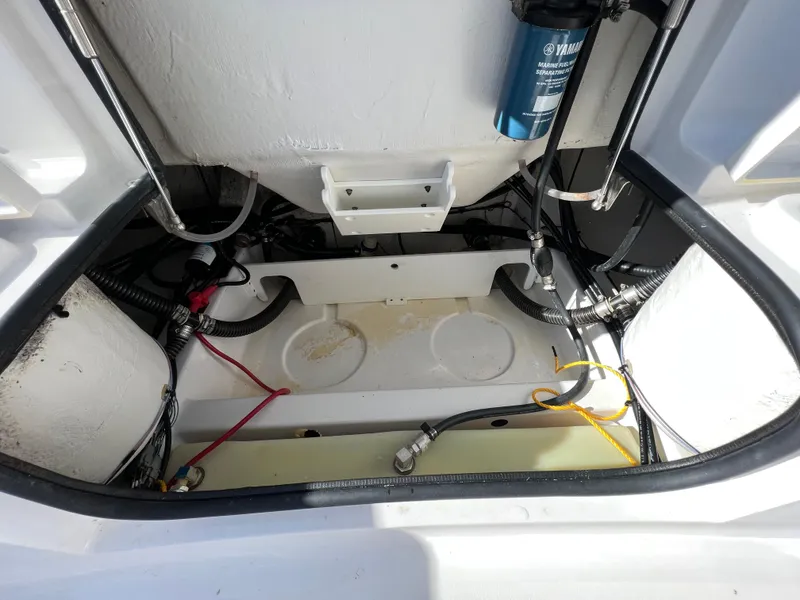 Slide: The Image of 2021 Sportsman Heritage 231 Center Console boat interior wiring and components. - 43