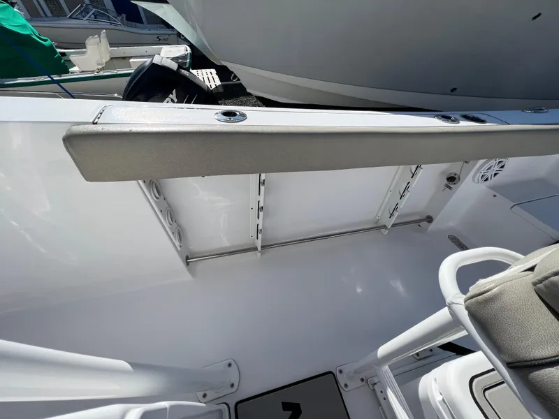 Slide: The Image of 2021 Sportsman Heritage 231 Center Console interior with seating and storage features. - 46