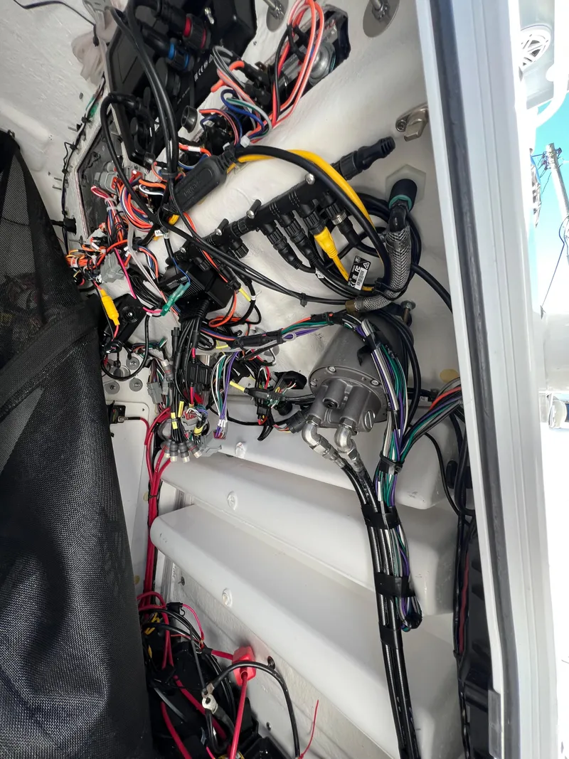 Slide: The Image of 2021 Sportsman Heritage 231 Center Console wiring and electrical components. - 48
