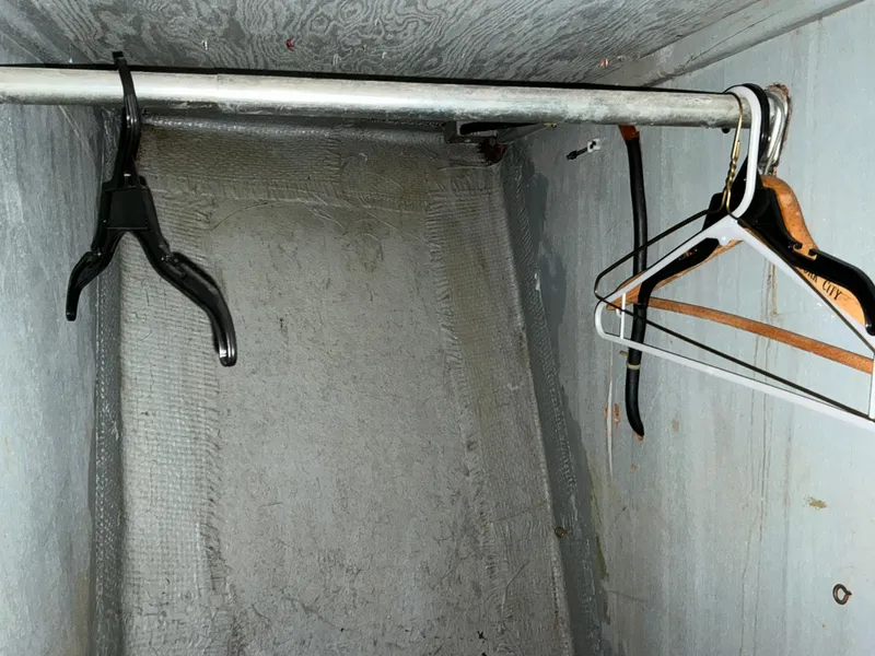 Slide: The Image of Empty closet with hangers in a 1978 Californian 34 LRC boat. - 21