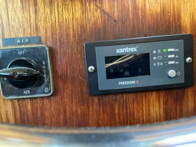 Slide: The Image of Control panel of a 1978 Californian 34 LRC with Xantrex Freedom X inverter. - 28