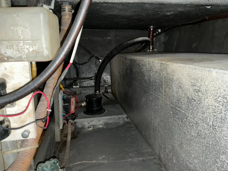 Slide: The Image of 1978 Californian 34 LRC engine compartment with wiring and hoses. - 39