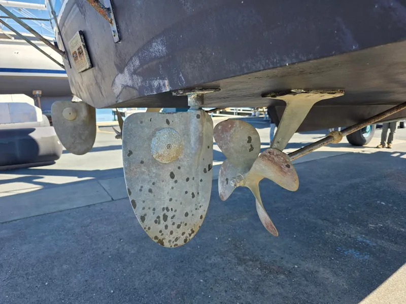 Slide: The Image of 1978 Californian 34 LRC boat propeller and rudder detail in dry dock. - 4