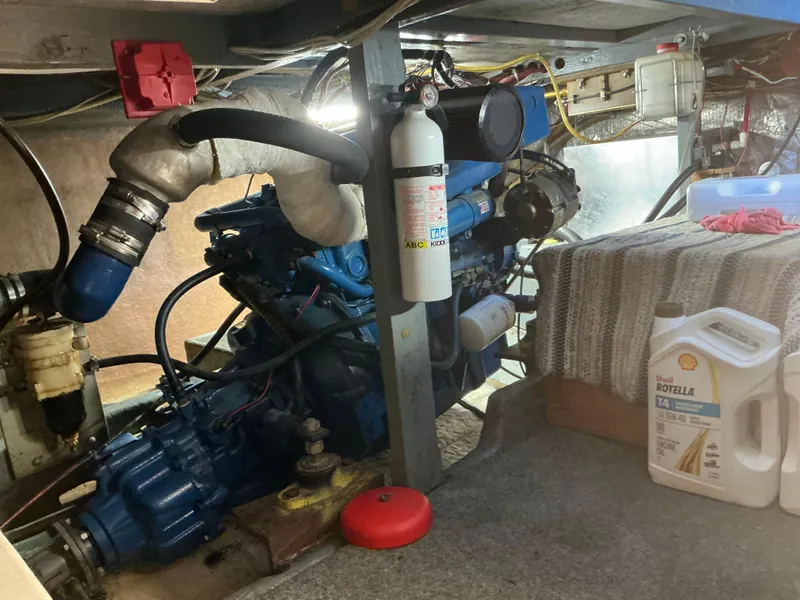 Slide: The Image of Engine room of a 1978 Californian 34 LRC with visible components and maintenance supplies. - 46
