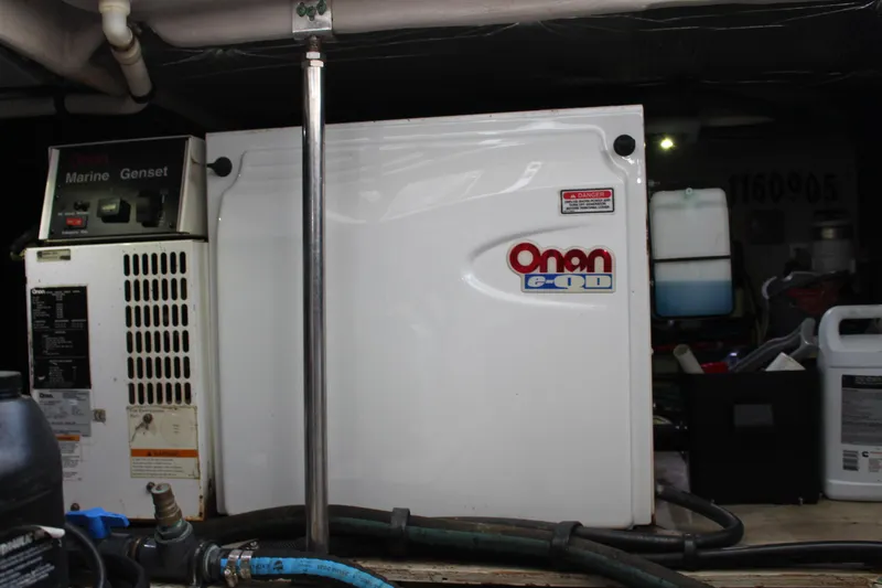 Slide: The Image of Onan generator in a 2005 Sea Ray 420 Sedan Bridge engine room. - 28