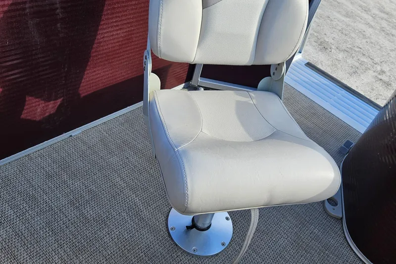 Slide: The Image of 2019 Bennington 20 SX boat seat on carpeted deck. - 15