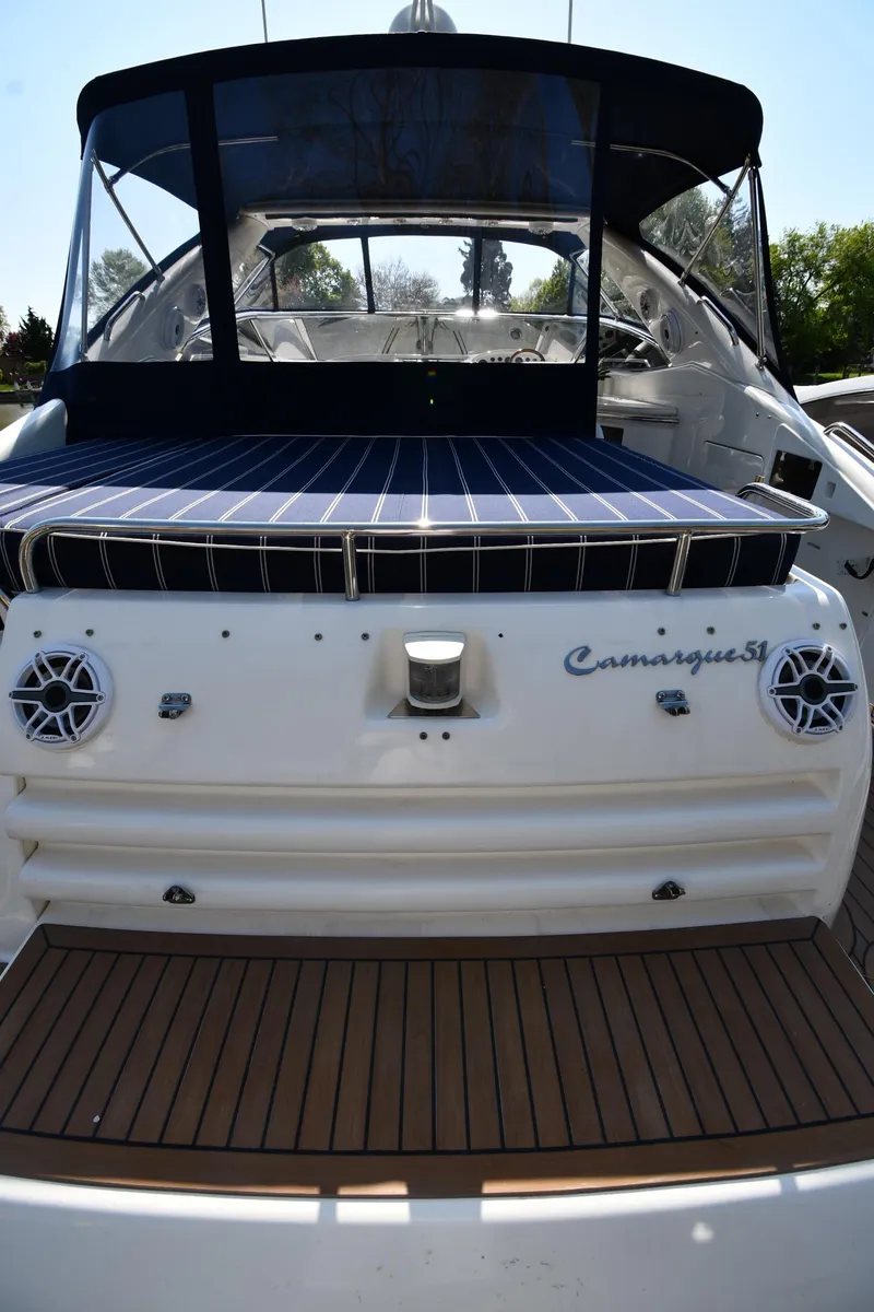 Slide: The Image of 1996 Sunseeker Camargue 51 yacht with sleek design and spacious deck. - 12