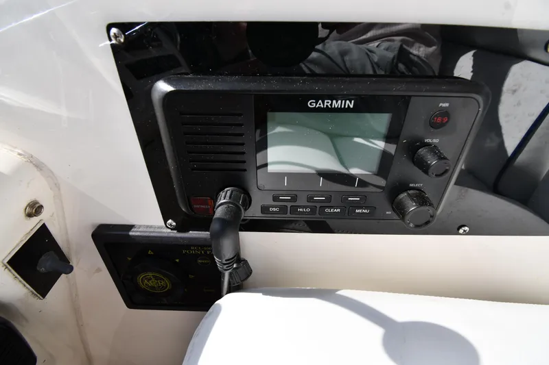 Slide: The Image of Garmin marine radio on 1996 Sunseeker Camargue 51 yacht dashboard. - 19