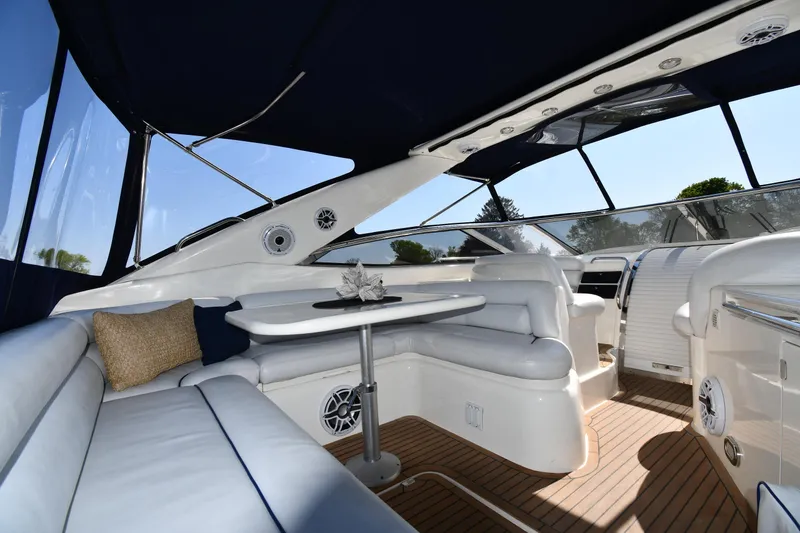 Slide: The Image of Luxurious interior of 1996 Sunseeker Camargue 51 yacht with elegant seating and table. - 26