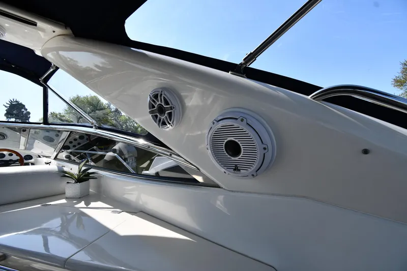 Slide: The Image of 1996 Sunseeker Camargue 51 yacht interior with speakers and seating area. - 29