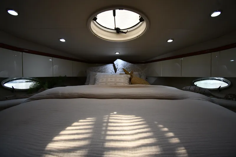 Slide: The Image of Luxurious cabin interior of 1996 Sunseeker Camargue 51 yacht with cozy bedding. - 35