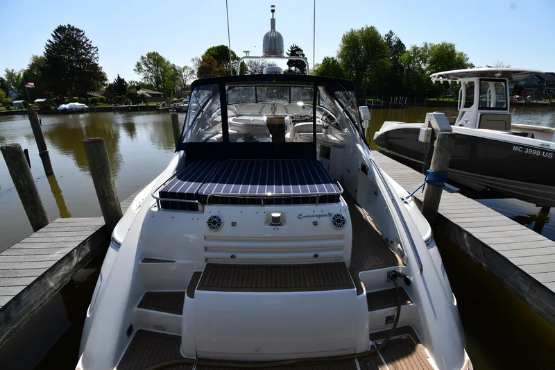 Slide: The Image of 1996 Sunseeker Camargue 51 yacht docked at a marina, rear view. - 5