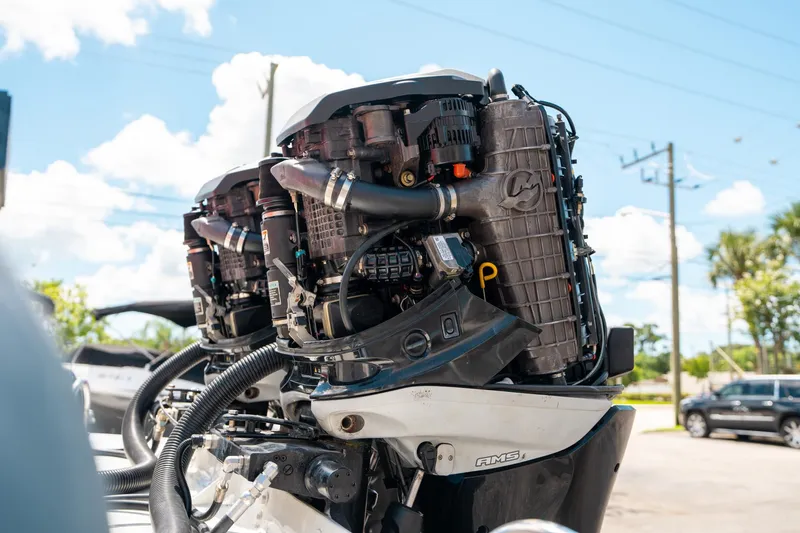 Slide: The Image of Close-up of Pirelli 1100 boat engines, 2015 model, under a clear blue sky. - 16