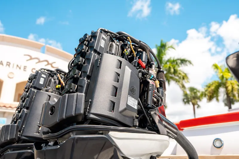 Slide: The Image of 2015 Pirelli 1100 engine close-up with tropical background and clear sky. - 18