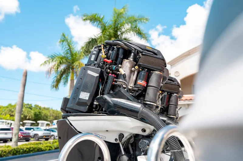 Slide: The Image of 2015 Pirelli 1100 engine with palm trees and blue sky background. - 19