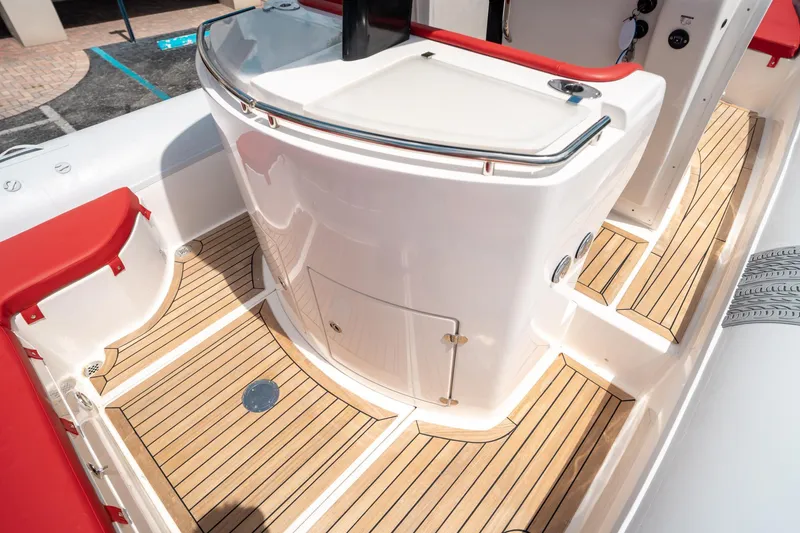 Slide: The Image of Pirelli 1100 boat interior, 2015 model, featuring teak flooring and red accents. - 38