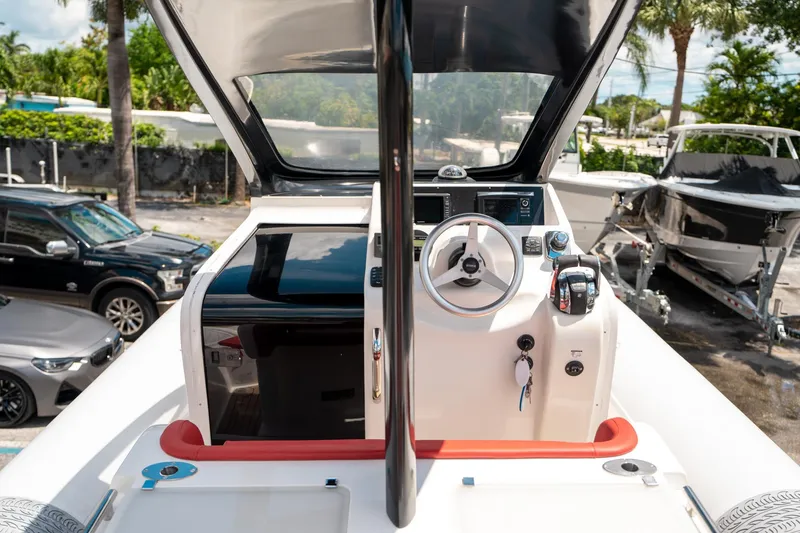 Slide: The Image of Pirelli 1100 boat cockpit, 2015 model, featuring steering wheel and control panel. - 45