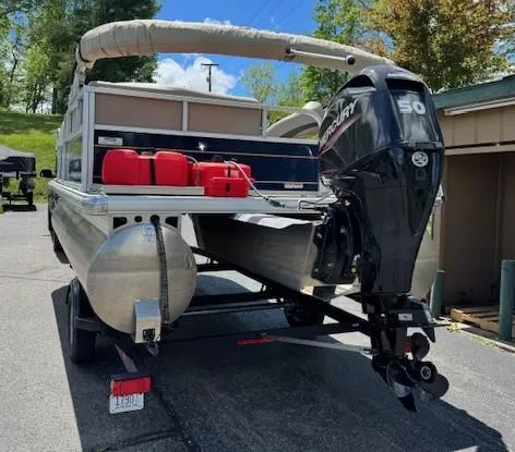 Slide: The Image of 2023 Sun Tracker Bass Buggy 16 XL Select pontoon boat with Mercury outboard motor. - 12