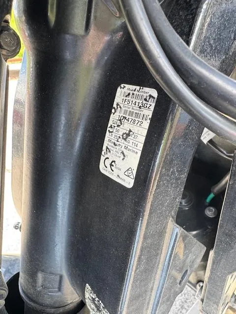 Slide: The Image of Close-up of a 2023 Sun Tracker Bass Buggy 16 XL Select engine label. - 9