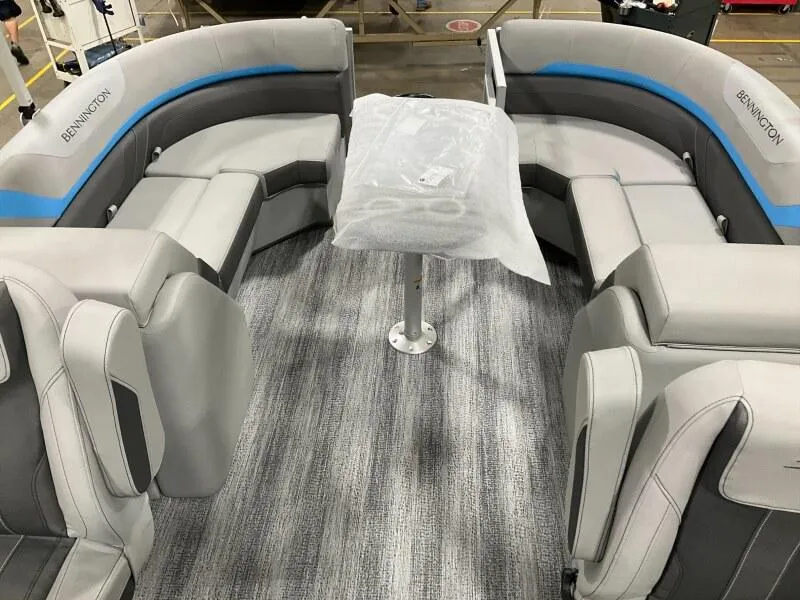 Slide: The Image of 2025 Bennington 22 SSRX boat interior with gray seating and table. - 5