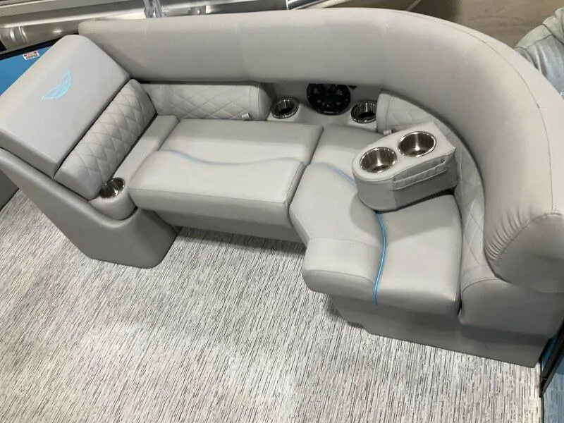 Slide: The Image of Luxurious seating on 2025 Bennington 22 LSB boat with cup holders and quilted design. - 5