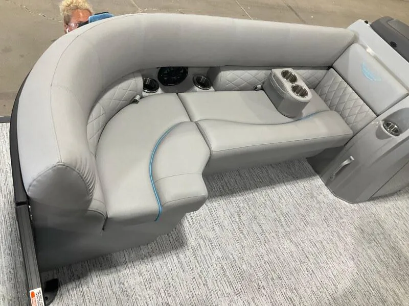 Slide: The Image of Luxurious seating on 2025 Bennington 22 LSB boat with quilted upholstery and cup holders. - 6