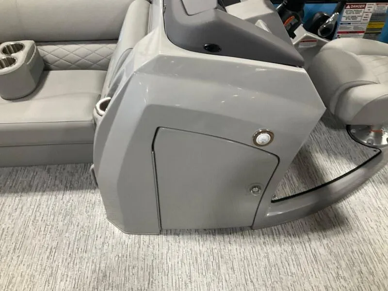 Slide: The Image of 2025 Bennington 22 LSB boat interior with gray seating and console. - 9