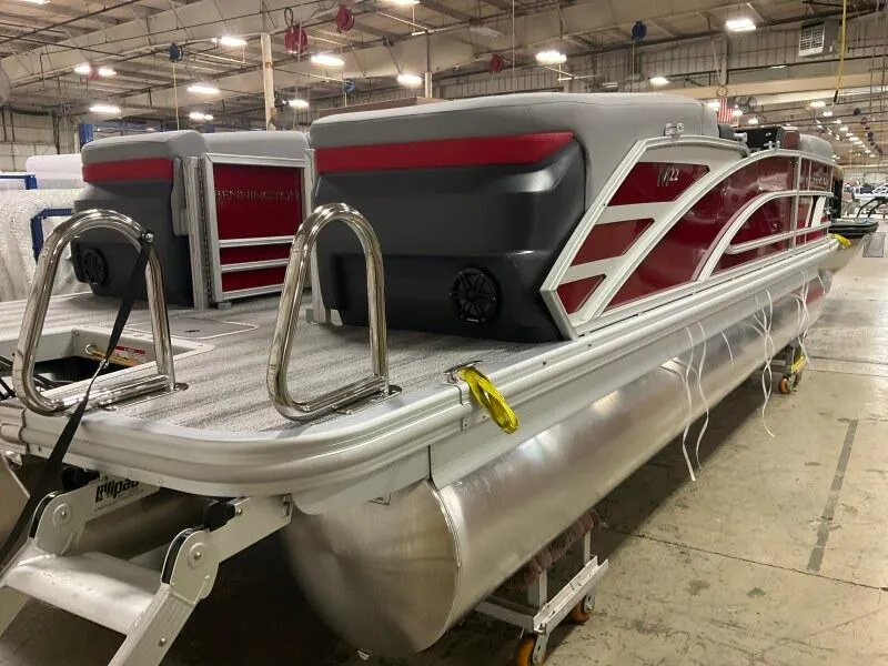 Slide: The Image of 2025 Bennington 22 MFB pontoon boat in a warehouse setting. - 3