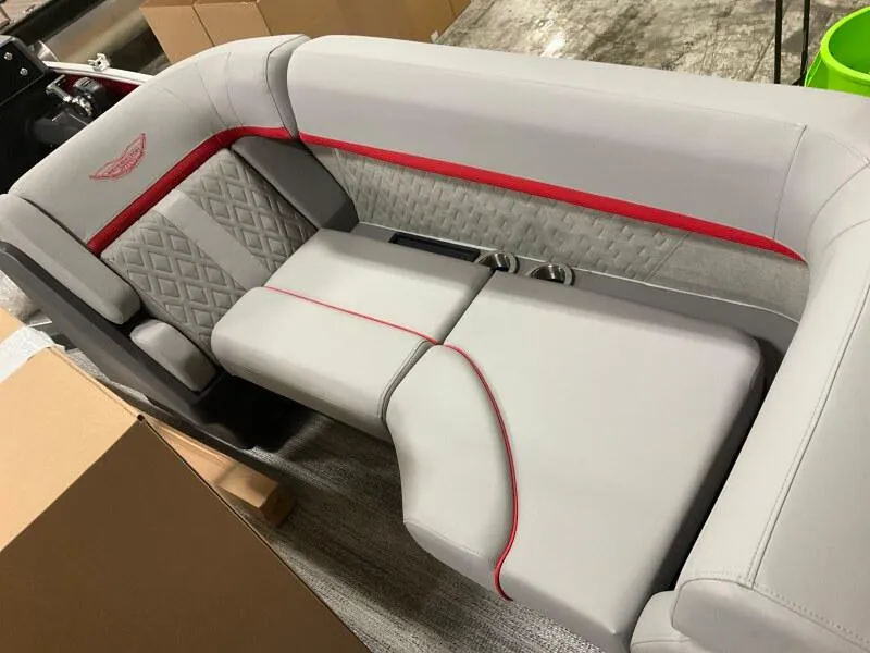Slide: The Image of Luxurious seating in 2025 Bennington 22 MFB boat with elegant gray and red accents. - 4