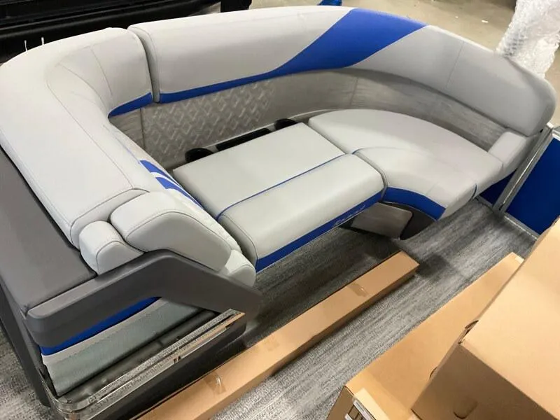 Slide: The Image of 2025 Bennington 22 MFB boat seating with gray and blue upholstery, showcasing modern design. - 4