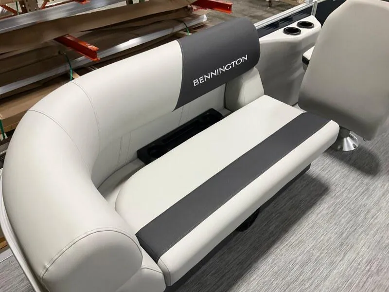 Slide: The Image of 2025 Bennington S 22 SSR boat seating with gray and white upholstery. - 6