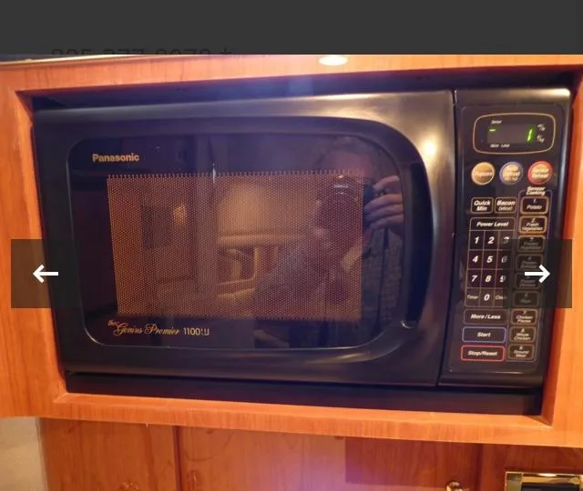 Slide: The Image of Built-in Panasonic microwave in 1999 Sea Ray 380 Sundancer yacht kitchen. - 18
