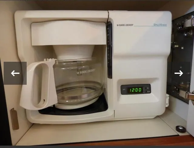 Slide: The Image of Black & Decker coffee maker with digital clock on a Sea Ray 380 Sundancer yacht. - 19