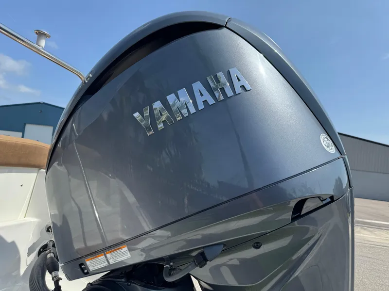 Slide: The Image of Yamaha outboard motor on 2022 Sea Hunt Ultra 234 boat, close-up view. - 17