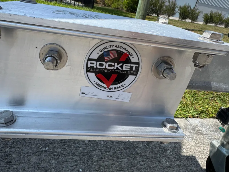 Slide: The Image of Rocket Aluminum Trailers quality assurance label on Sea Hunt Ultra 234, 2022 model. - 26